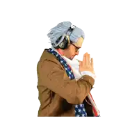 a man wearing a wig and headphones is praying with his hands folded