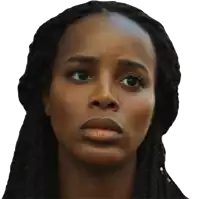 a close up of a woman 's face with braids and a serious look on her face