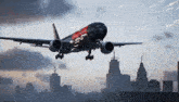 a coca cola airplane flies over a city