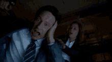 Ouch GIF - X Files Ouch Ow GIFs