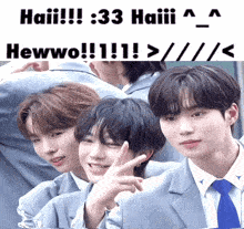 a group of young men are posing for a picture with the caption haiii 33 haiii hewwo !!! > / <