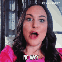 a woman in a pink shirt says no way