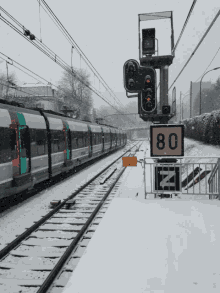rer b sous neige train rails snow its cold