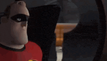 mr. incredible from the incredibles is wearing sunglasses and a red shirt .