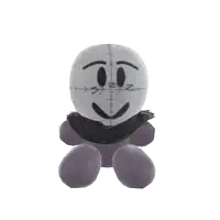 a stuffed animal with a black scarf around its neck and a smiley face