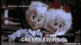 a boy and a girl are sitting next to each other with the words `` creepy twins '' written below them .
