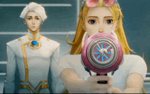 a girl is holding a pink object in front of her face