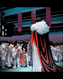 a man in a red cape stands in front of a crowd of people with a sign that says u.n.