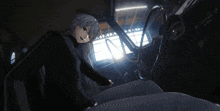 a cartoon character is standing in a dark room looking at a car
