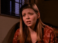 a woman says " does that make sense " while looking at the camera