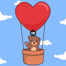 a teddy bear is flying in a hot air balloon with a heart on it