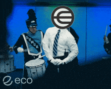 a man in a marching band has a euro symbol on his head