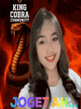 a girl is smiling in front of a king cobra community poster