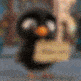 a blurry picture of a penguin holding a sign that says " i love you "