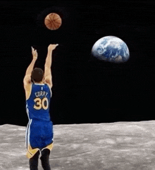 a basketball player wearing a number 30 jersey throws a basketball