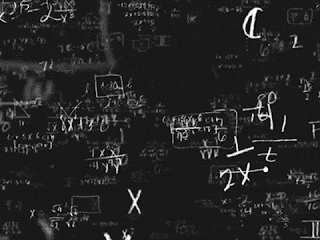 a black board with a lot of math equations on it