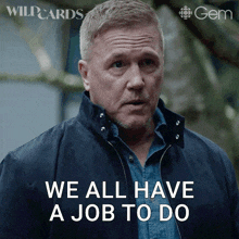 a man in a blue jacket with the words we all have a job to do
