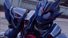 a close up of a masked rider from kamen rider zero one .