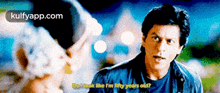a man is talking to a woman and says " do i look like i 'm fifty years old ? "