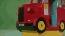 a toy bus with the license plate bus 1
