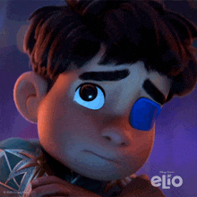 a close up of a child 's face with the word elio on the bottom