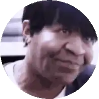 a close up of a person 's face in a circle