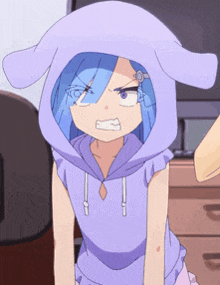 a girl with blue hair is wearing a purple hoodie with ears on it