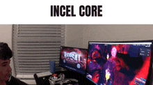 a man sits at a desk playing a video game with the words " incel core " above him