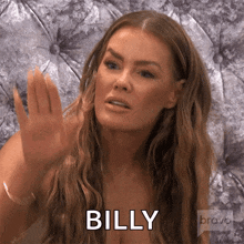 a woman with long hair says billy in front of a bravo logo