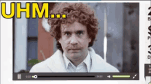 a video of a man with curly hair and the words uhm on the top