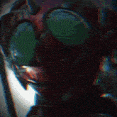 a blurred image of a superhero with the letters flz visible