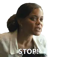a woman in a white jacket says " stop "