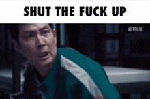 a picture of a man with the words shut the fuck up on the top
