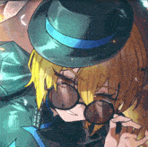 a close up of a person wearing sunglasses and a top hat