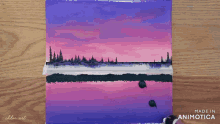 a painting of a sunset with the words made in animotica on the bottom