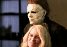 Smiling Mike Meyers GIF - Smiling Mike Meyers Jamie Lee Curtis GIFs