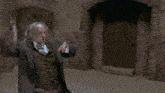 a person in a white shirt and black pants is falling