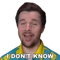 a man wearing a blue shirt with bananas on it says i don 't know