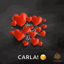 a happy valentine 's day card for carla with red hearts