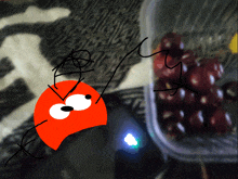 a drawing of a cartoon character standing next to a container of red grapes