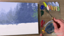 a painting is being painted on a canvas with the words made in animatica visible