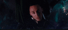 a close up of a person 's face with a galaxy in the background