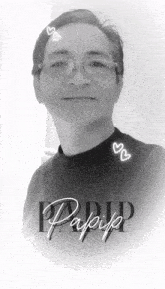 a black and white photo of a man with glasses and the name papio on the bottom