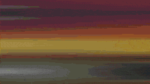 a painting of a sunset with a blurred background