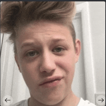 a young man making a funny face with an arrow pointing to the left