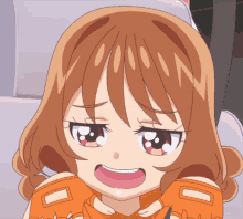 a close up of a girl 's face with the letter n on her hair