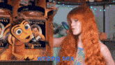a woman with red hair is standing next to a bee and a jar of honey that says wrong sex