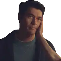 a close up of a man 's face with a woman 's hand on his chin