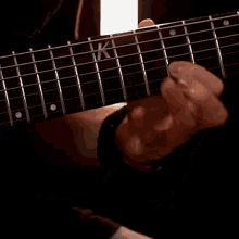 Plucking Chords Cole Rolland GIF - Plucking Chords Cole Rolland Playing Guitar GIFs