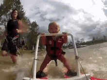 7 Month Old Baby Waterskiing GIF